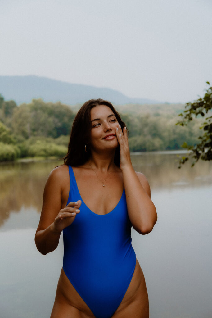 Professional model posing during a CoTZ Skincare commercial photoshoot in Hudson Valley, photographed by Julieanne Browning of Pine & Fable Photography.